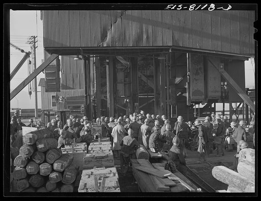 Butte, Montana. Anaconda Copper Mining Company. Group of miners on the surface getting ready to go down in the cage