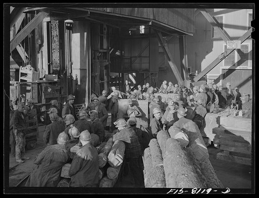 Butte, Montana. Anaconda Copper Mining Company. Group of miners on the surface getting ready to go down in the cage
