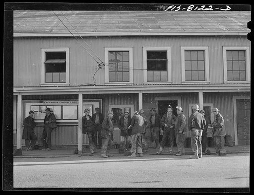 Untitled photo, possibly related to: Butte, Montana. Anaconda Copper Mining Company. Miners outside change-room at headframe of mountain con mine