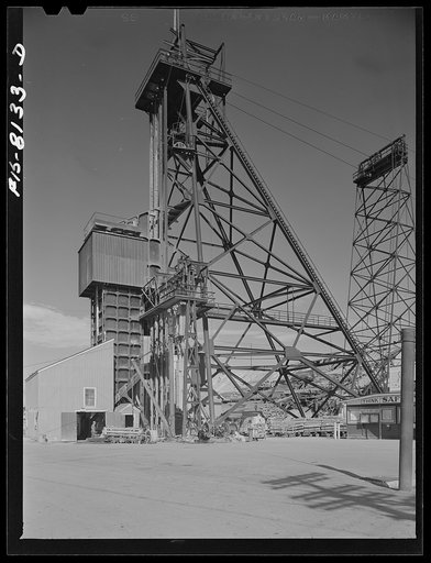 Untitled photo, possibly related to: Butte, Montana. Anaconda Copper Mining Company. Headframe and hoist towers of the mountain con mine