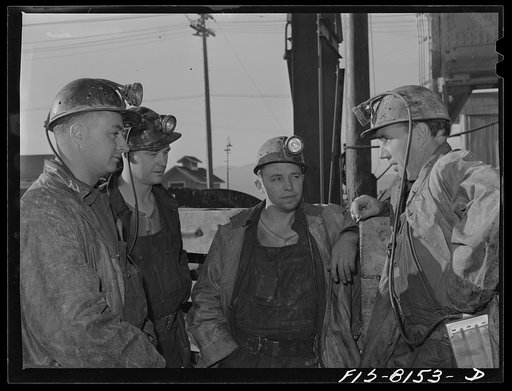 Butte, Montana. Anaconda Copper Mining Company. Copper miners waiting to go down in the cage