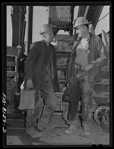 Butte, Montana. Anaconda Copper Mining Company. Copper miners waiting to go down in the cage