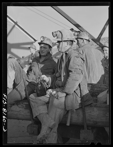 Untitled photo, possibly related to: Butte, Montana. Anaconda Copper Mining Company. Miners on the surface waiting to go down in the cage
