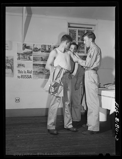 Fort Belvoir, Virginia. George Camblair getting his injections at the reception center