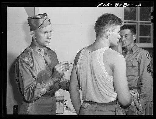 Untitled photo, possibly related to: Fort Belvoir, Virginia. George Camblair getting his injections at the reception center