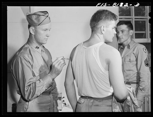 Untitled photo, possibly related to: Fort Belvoir, Virginia. George Camblair getting his injections at the reception center
