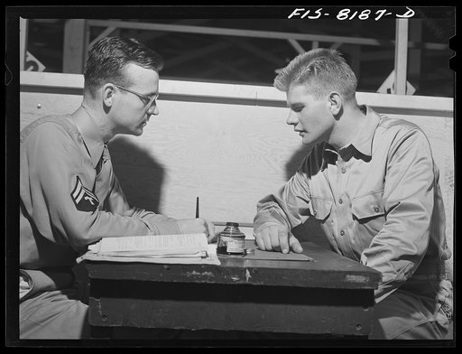 Untitled photo, possibly related to: Fort Belvoir, Virginia. Interviewing George Camblair concerning his special skills and qualifications