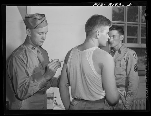 Fort Belvoir, Virginia. George Camblair getting his injections at the reception center
