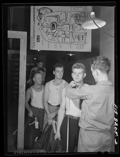 Fort Belvoir, Virginia. All of George Camblair's sizes are recorded at the clothing warehouse