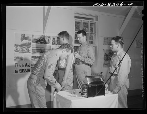 Fort Belvoir, Virginia. George Camblair getting his injections at the reception center