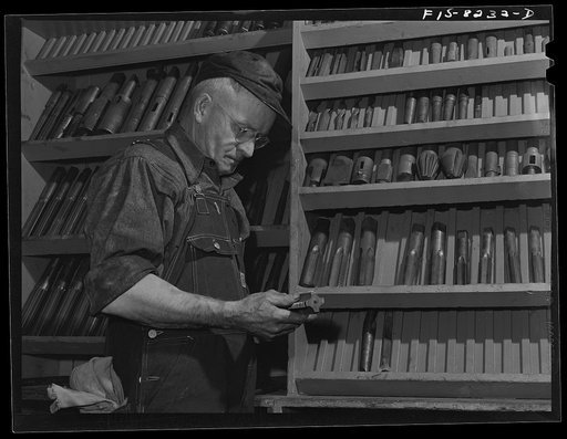 Butte, Montana. Anaconda Copper Mining Company. Head machinist with dies, taps and drills
