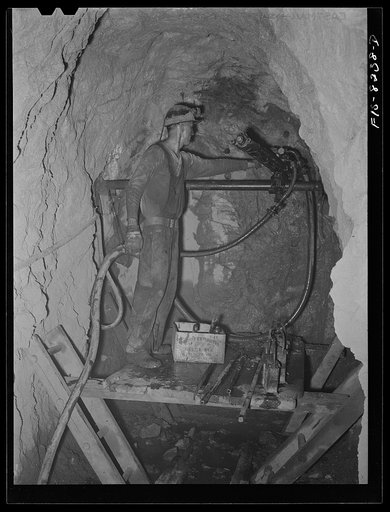 Butte, Montana. Anaconda Copper Mining Company. Drilling in an ore body of copper mine