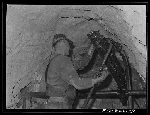 Butte, Montana. Anaconda Copper Mining Company. Drilling in the ore body of a copper mine