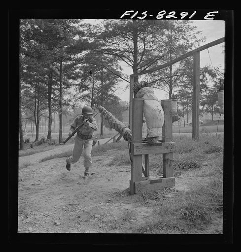 Untitled photo, possibly related to: Fort Belvoir, Virginia. Sergeant George Camblair learning to use the bayonet