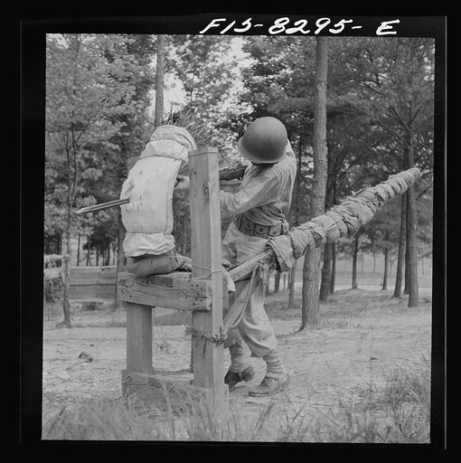 Fort Belvoir, Virginia. Sergeant George Camblair learning to use the bayonet