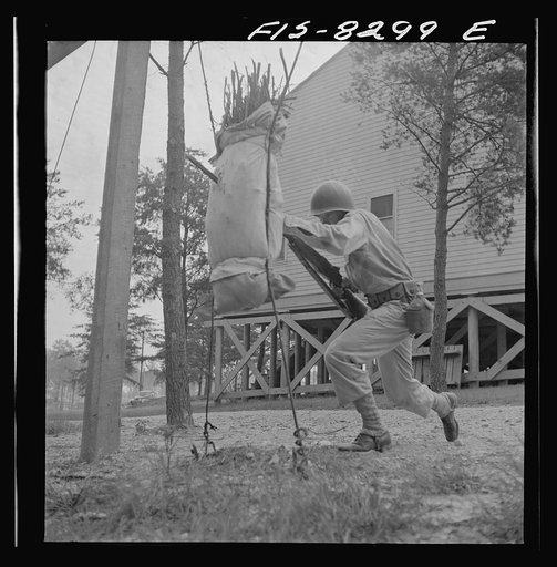 Fort Belvoir, Virginia. Sergeant George Camblair learning to use the bayonet
