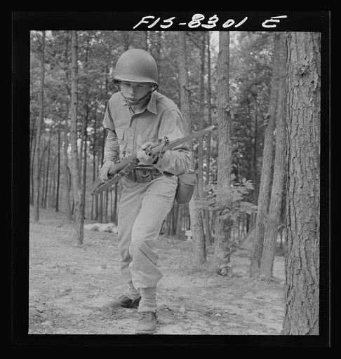 Untitled photo, possibly related to: Fort Belvoir, Virginia. Sergeant George Camblair learning to use the bayonet