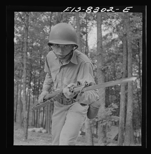 Fort Belvoir, Virginia. Sergeant George Camblair learning to use the bayonet