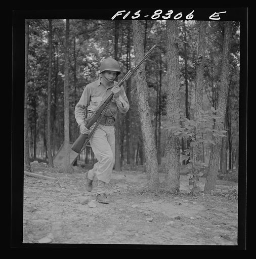 Untitled photo, possibly related to: Fort Belvoir, Virginia. Sergeant George Camblair learning to use the bayonet