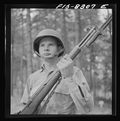 Untitled photo, possibly related to: Fort Belvoir, Virginia. Sergeant George Camblair learning to use the bayonet