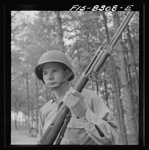 Untitled photo, possibly related to: Fort Belvoir, Virginia. Sergeant George Camblair learning to use the bayonet