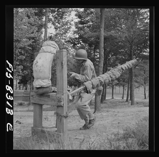 Untitled photo, possibly related to: Fort Belvoir, Virginia. Sergeant George Camblair learning to use the bayonet