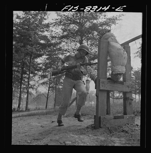 Fort Belvoir, Virginia. Sergeant George Camblair learning to use the bayonet