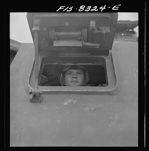Fort Belvoir, Virginia. Sergeant George Camblair learning to drive a tank