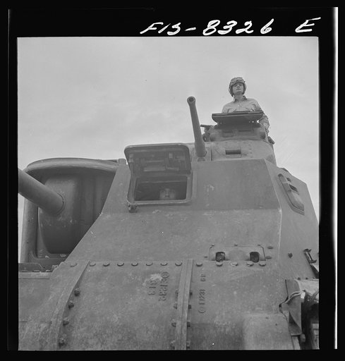 Fort Belvoir, Virginia. Sergeant George Camblair learning the operation of a tank