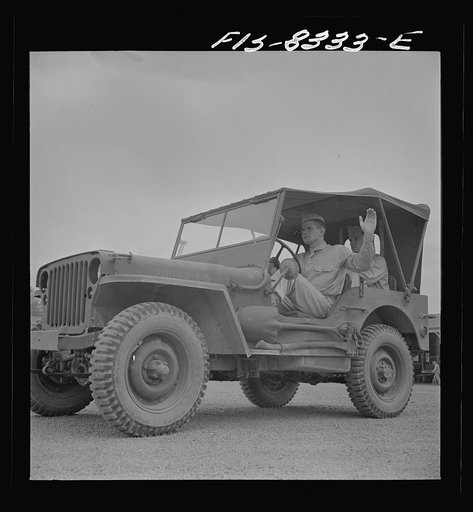 Untitled photo, possibly related to: Fort Belvoir, Virginia. Sergeant George Camblair learning to drive a jeep