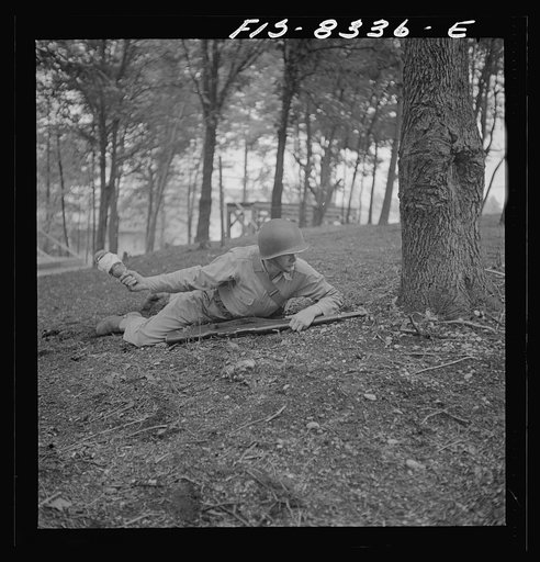 Untitled photo, possibly related to: Fort Belvoir, Virginia. Sergeant George Camblair learning how to use a "Molotov cocktail"