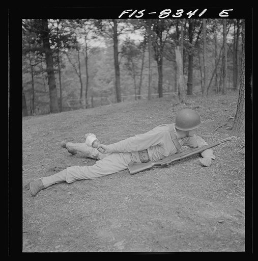 Untitled photo, possibly related to: Fort Belvoir, Virginia. Sergeant George Camblair learning how to use a "Molotov cocktail"