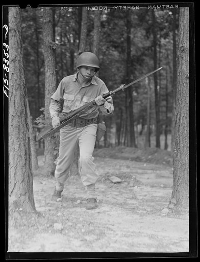 Untitled photo, possibly related to: Fort Belvoir, Virginia. Sergeant George Camblair learning to use the bayonet