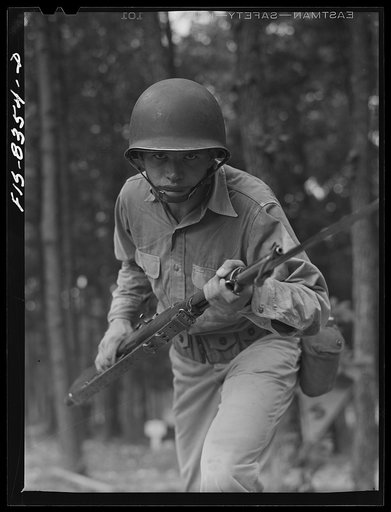 Fort Belvoir, Virginia. Sergeant George Camblair learning to use the bayonet