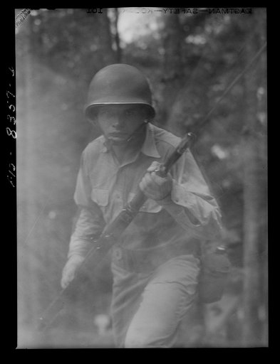 Untitled photo, possibly related to: Fort Belvoir, Virginia. Sergeant George Camblair learning to use the bayonet