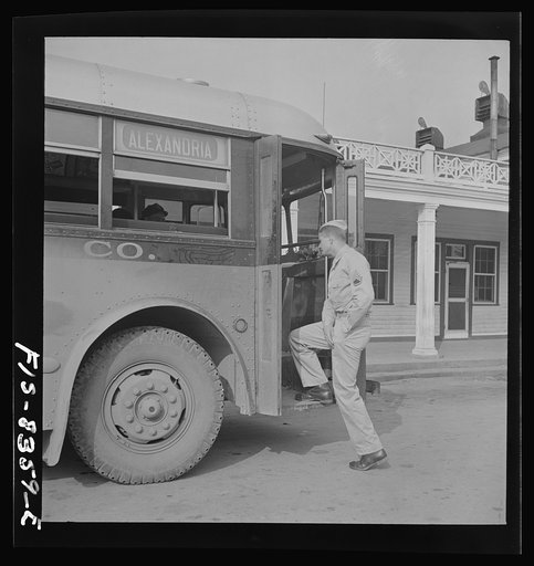 Fort Belvoir, Virginia. Sergeant George Camblair taking the bus on short visit home for the weekend