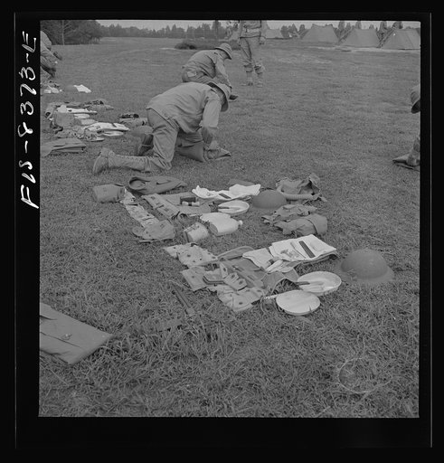 Fort Belvoir, Virginia. Sergeant George Camblair learning how to make up his pack