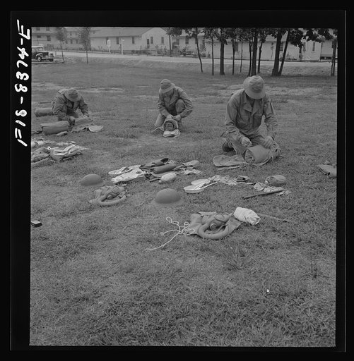 Fort Belvoir, Virginia. Sergeant George Camblair learning how to make up his pack