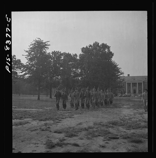 Untitled photo, possibly related to: Fort Belvoir, Virginia. Sergeant George Camblair drilling with the rest of his buddies