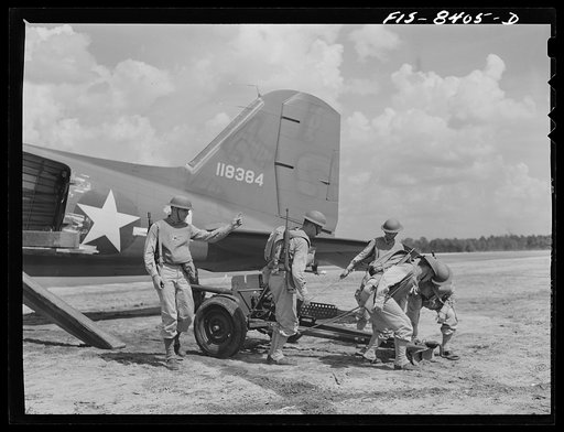 Fort Bragg, North Carolina. Unloading a 37mm gun from a transport plane in a military demonstration