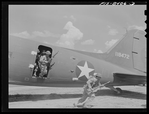 Untitled photo, possibly related to: Fort Bragg, North Carolina. Unloading a 37mm gun from a transport plane in a military demonstration