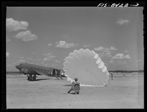 Untitled photo, possibly related to: Fort Bragg, North Carolina. Parachutist in a military demonstration