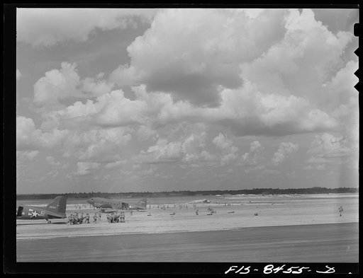 Untitled photo, possibly related to: Fort Bragg, North Carolina. Airborne motorcyclists and artillery taking over an airfield in a military demonstration