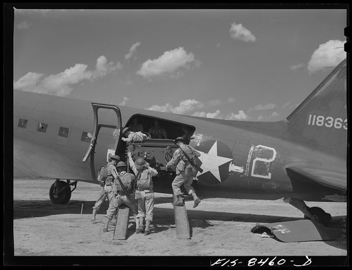 Fort Bragg, North Carolina. Removing a jeep from a transport plane in a military demonstration