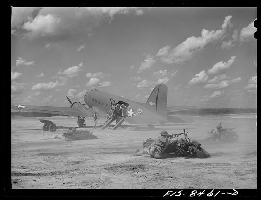 Fort Bragg, North Carolina. Airborne motorcyclists and artillery taking over an airfield in a military demonstration