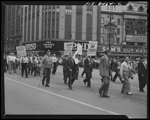 Detroit, Michigan. Members of the United Automobile Workers (UAW) of the Congress of Industrial Organizations (CIO) carrying various signs in the Labor Day parade