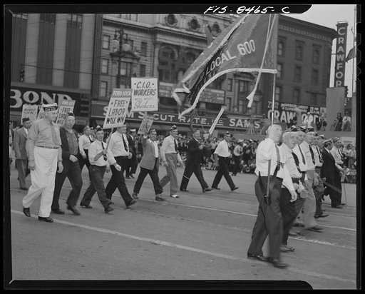 Detroit, Michigan. Ford Local 600 of the Congress of Industrial Organizations (CIO) carrying banners in the Labor Day parade