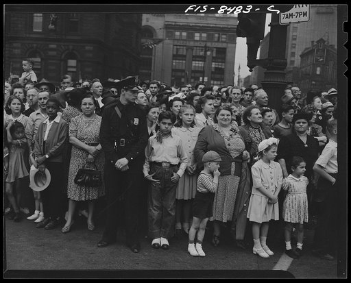Untitled photo, possibly related to: Detroit, Michigan. Spectators at Labor Day parade