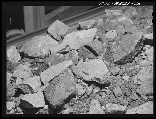 Anaconda smelter, Montana. Anaconda Copper Mining Company. Copper ore on conveyor belt just before being processed by the Symons crusher. The ore has been through the gyratory crusher