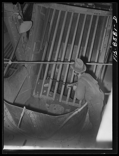Anaconda smelter, Montana. Anaconda Copper Mining Company. Removing jammed pieces of ore in the gyratory crusher